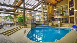 view of indoor pool with sun roof at Best Western Toni Inn in Pigeon Forge, Tennessee, USA